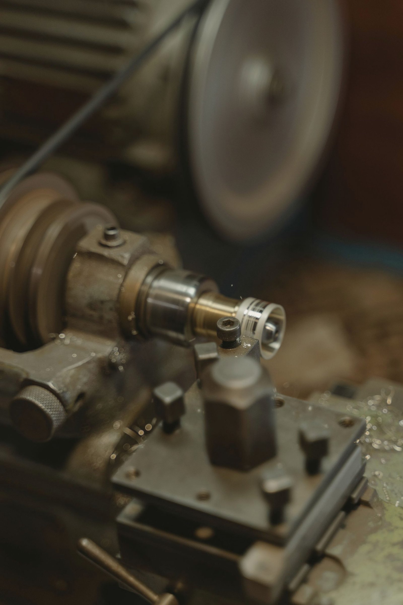 A metalworking lathe set up with a part in the chuck.